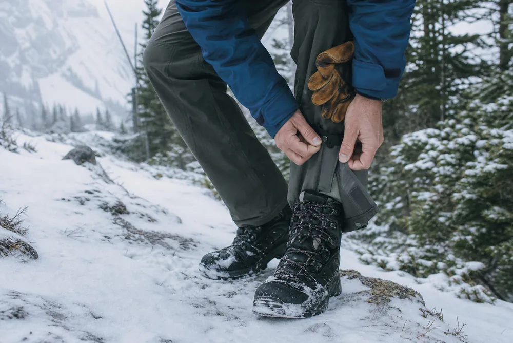Same hiking layering system shown adapted for a cold windy ridge with insulation and shell - what to wear hiking | KnowOutdoor