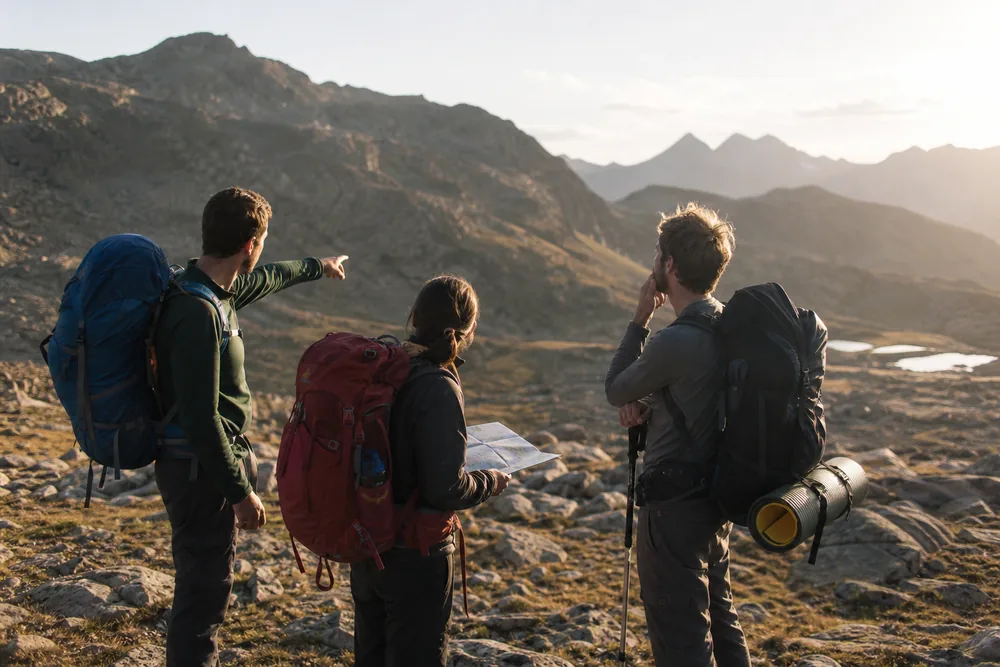 Route card compares a preferred camp with a later verified camp, showing water, arrival time, and a return checkpoint - Alternate camp decision | KnowOutdoor
